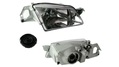Far Mazda 323 07.1998-12.2000 TYC dreapta fata , tip bec H4,  reglaj electric